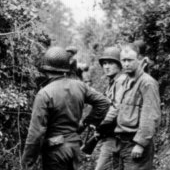Image shows US soldeirs in the bocage in 1944.